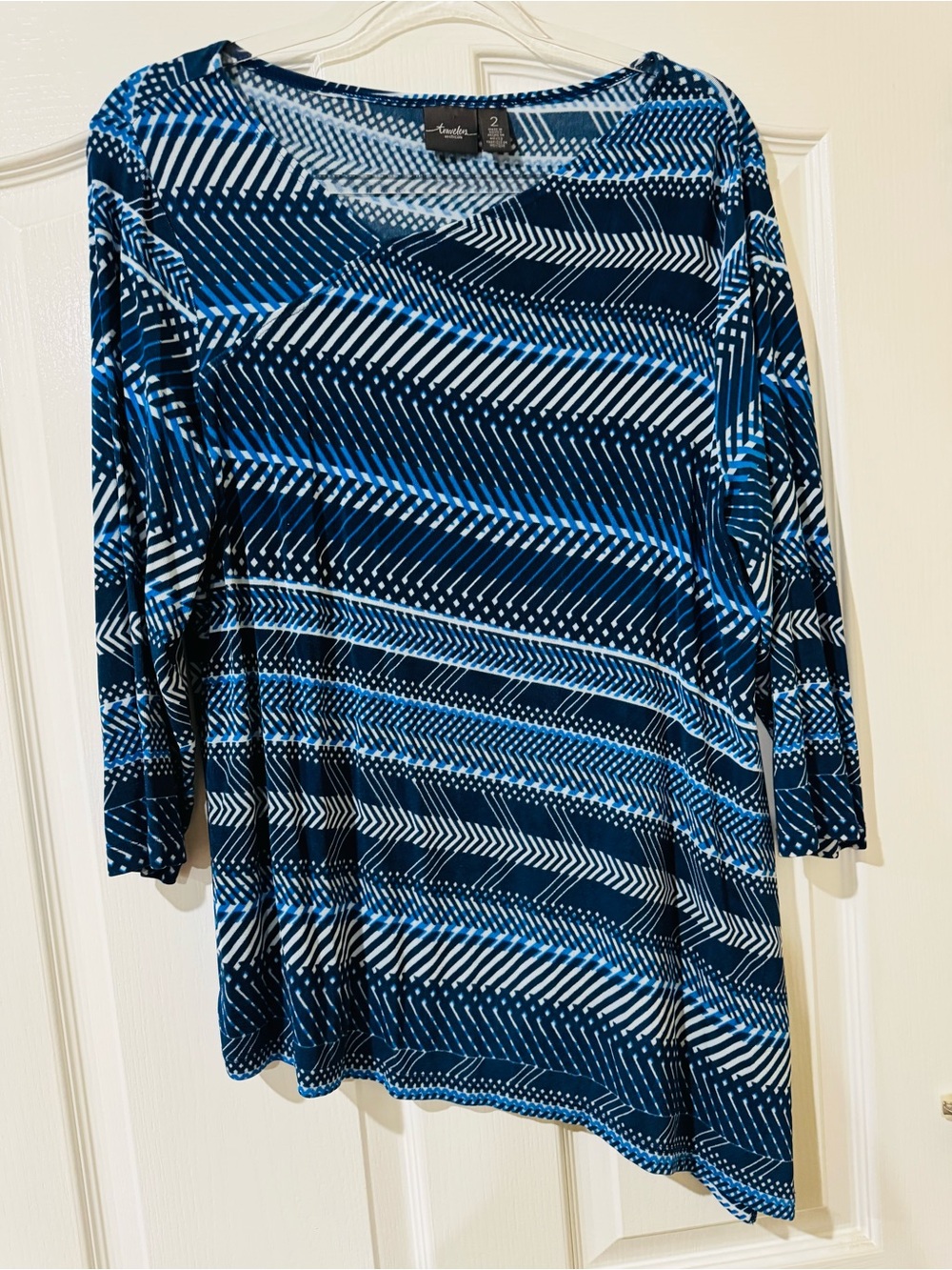 Traveler's by Chico's Blue Asymmetrical Top Size 2
(Large size 12)